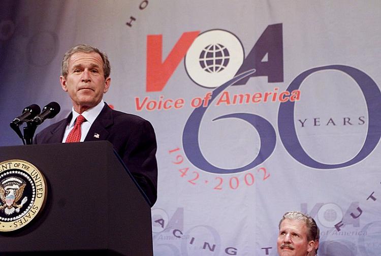 President Bush addresses the audience at the 60th anniversary of Voice of America on February 25, 2002. (AFP/Getty Images)