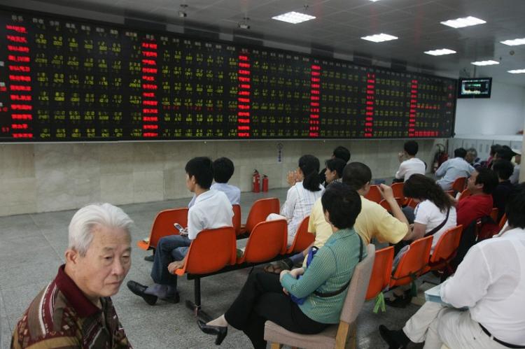 Unhappy investors. (AFP/Getty Images)