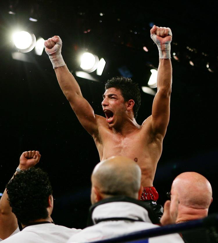 Muslim Australian Billy Dib celebrates his world title victory. (Matt King/Getty Images)