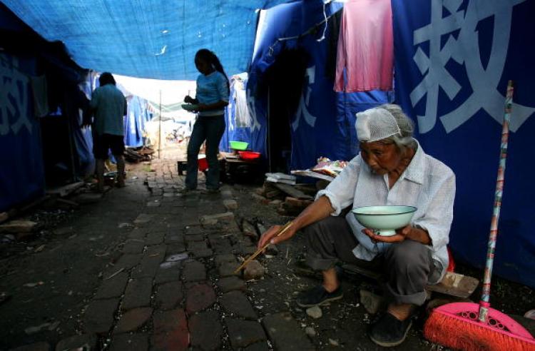 A 6.1- magnitude quake hit Sichuan Province on August 1. The photo shows residents in Leigu town set-up tents after the May 12 7.9-magnitude earthquake. (Guang Niu/Getty Images)