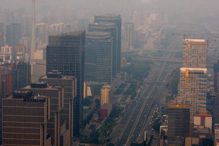 The city skyline is shrouded in smog two days before the opening of the Beijing 2008 Olympic Games on August 6, 2008 in Beijing, China. (Paula Bronstein/Getty Images)