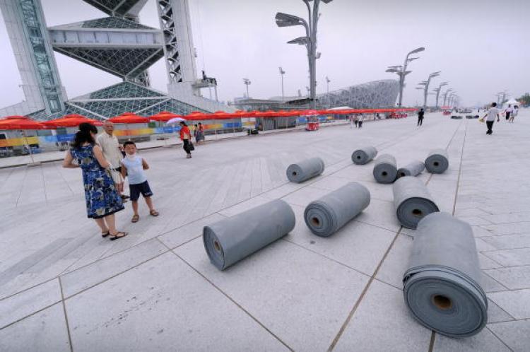 Visitors to the Olympic Green in Beijing. (Peter Parks/AFP/Getty Images)