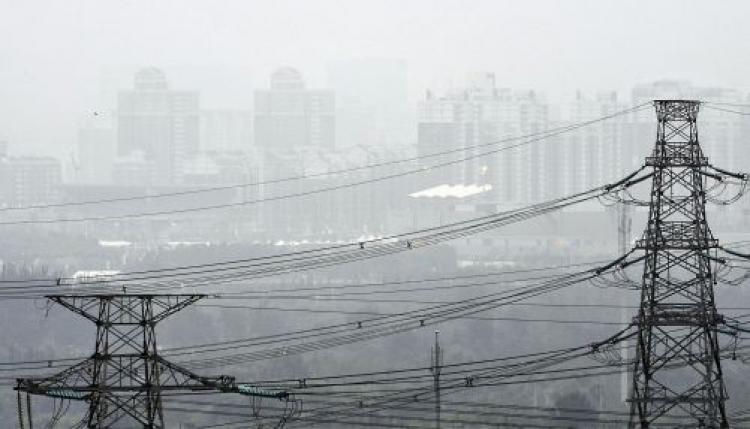 Smog is pictured over Beijing on August 13, 2008, on day 5 of the 2008 Beijing Olympic Games.  (Philippe Huguen/AFP/Getty Images)