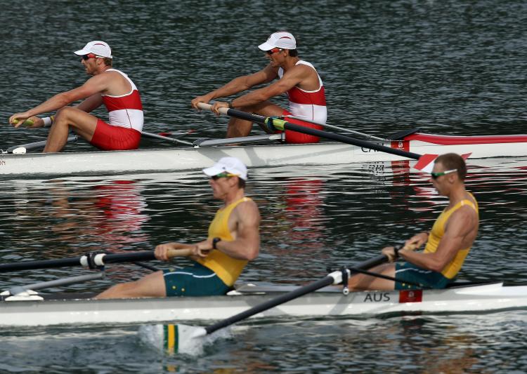 Canada's David Calder and Scott Frandsen (top) and Australia's Drew Ginn and Duncan Free compete in the men's pair final at the Shunyi Rowing and Canoeing Park (Mustafa Ozer/AFP/Getty Images)