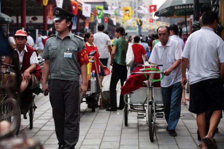 People have complained that there is a lack of festivity for the Games in Beijing. It seems most likely that those who are the happiest are the ones profiting from the games. ( Paula Bronstein/Getty Images) 