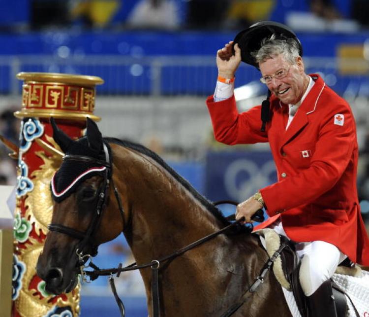 Canada' s Ian Millar reacts after riding with 'In Style' during the Equestrian Jumping Individual competition of the 2008 Beijing Olympic Games in Hong Kong on August 18, 2008. (David Hecker/AFP/Getty Images)