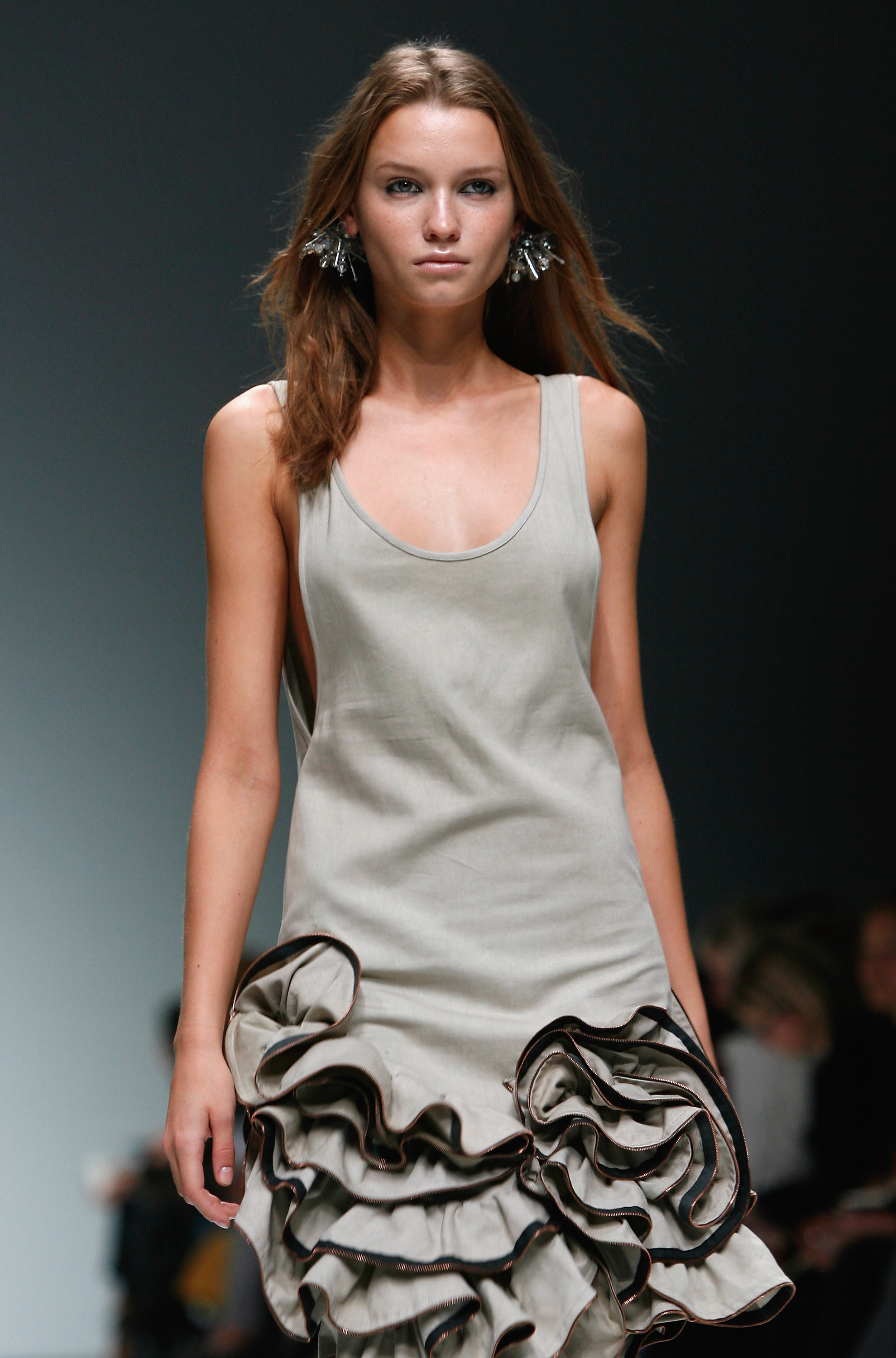 A model walks the catwalk in the Emma Cook fashion show during London Fashion Week (Gareth Cattermole/Getty Images)