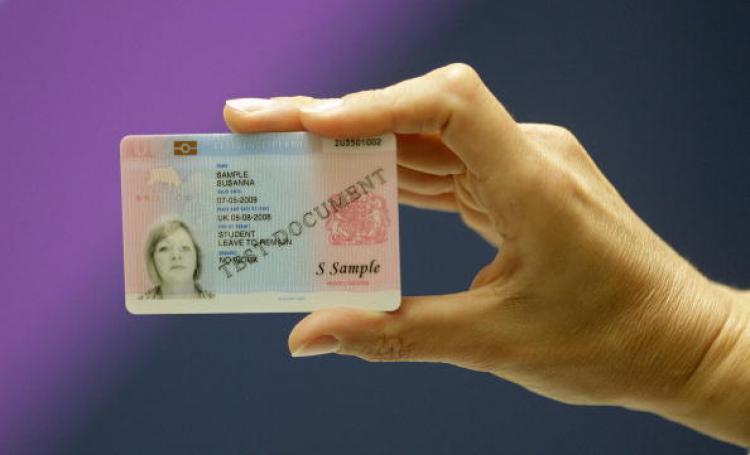 Identity Cards, to be scrapped by the new UK coalition government, were issued in November 2008 to non-European foreign nationals resident in the UK. They feature the holder's name, date of birth, photograph, fingerprint record and other biometric data. (Shaun Curry/AFP/Getty Images)