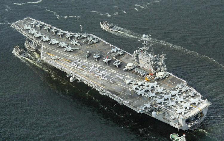 U.S. nuclear powered aircraft carrier George Washington heads for the Yokosuka US naval base in Yokosuka city in Kanagawa prefecture. It replaces the Kitty Hawk as the only forward based U.S. carrier. (AFP/Getty Images)