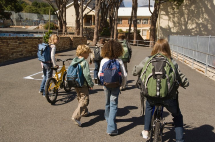 Children get stressed due to exclusion, and victimization, such as gossiping and hitting. However, the effect is diminished if victims have at least a few good friends. (Photos.com)