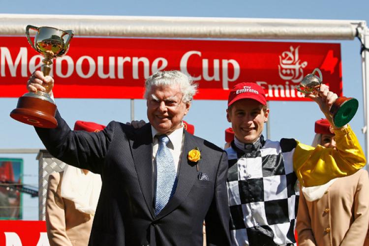 Bart Cummings and jockey Blake Shinn celebrate with the trophies after their horse Viewed won the Emirates Melbourne Cup during The Melbourne Cup Carnival meeting at Flemington Racecourse. (Quinn Rooney/Getty Images)