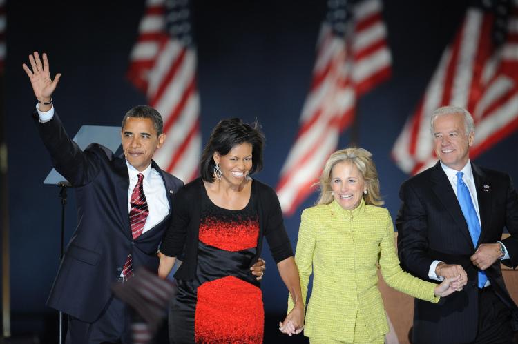 Democratic presidential candidate Barack Obama and his wife Michelle stand on stage with running mate Joe Biden and his wife Jill during their election night victory rally at Grant Park. (STAN HONDA/AFP/Getty Images)