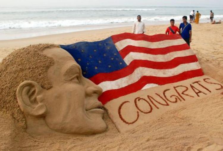 A sand sculpture congratulating US president-elect Barack Obama by Indian sand artist Sudarsan Patnaik is seen on a beach in Puri on Wednesday, Nov.5. (Sanjib Mukherjee/AFP/Getty Images)