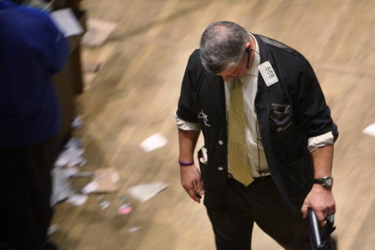 A trader works on the floor during the closing minutes of trading at the New York Stock Exchange in New York City. Worries about the economy still dominate post-election America. (Spencer Platt/Getty Images)
