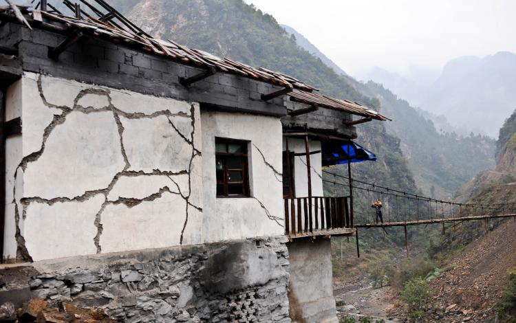 DEVASTATING CONSEQUENCES: A house damaged by the 2008 Wenchuan earthquake. The quake killed or buried approximately 90,000 people. (China Photos/Getty Images)