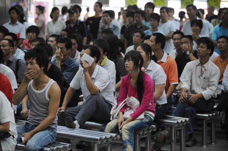 Unemployed Chinese look for work at an employment agency in the city of Xiamen in Fujian Province. In once-thriving Chinese manufacturing regions, the fate of migrant workers looks likely to lead to more public unrest. (Mark Ralston/AFP/Getty Images)