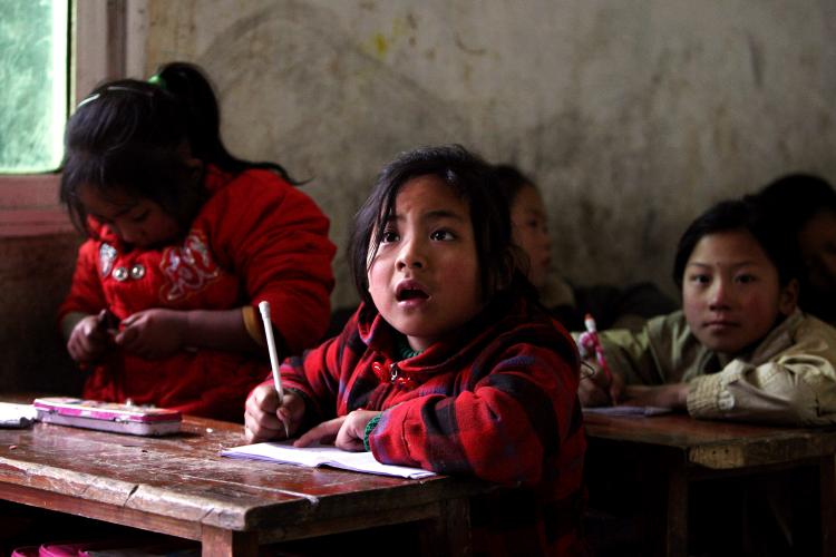 Students study at school in the village of Gulucan, Sichuan province. (Guang Niu/Getty Images)