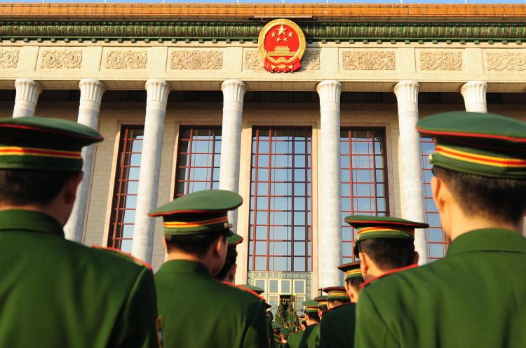 Chinese People's Liberation Army (PLA) officers at the Great Hall of the People in Tiananmen Square. Ex-servicemen and their families have been asked to expose the corruption in both the government and the military in China. (Frederic J Brown/AFP/Getty Images)