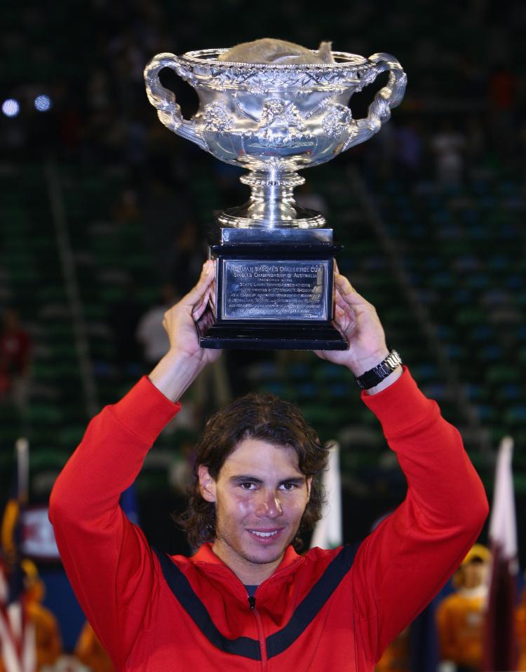 Rafael Nadal of Spain with the Norman Brookes Challenge Cup, his win makes him the first from his country to win an Australian Open singles championship . (Clive Brunskill/Getty Images)