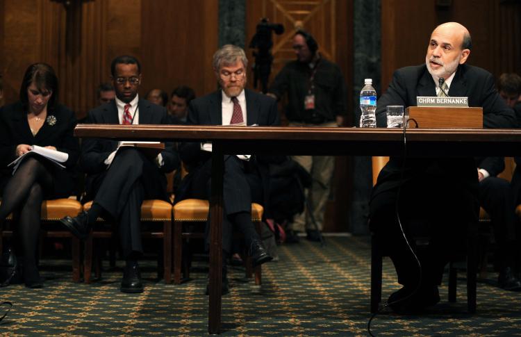 U.S. Federal Reserve Chairman Ben Bernanke(R) testifies before the Senate Banking Committtee March 3, 2009 on Capitol Hill in Washington, DC. (Tim Sloan/AFP/Getty Images)