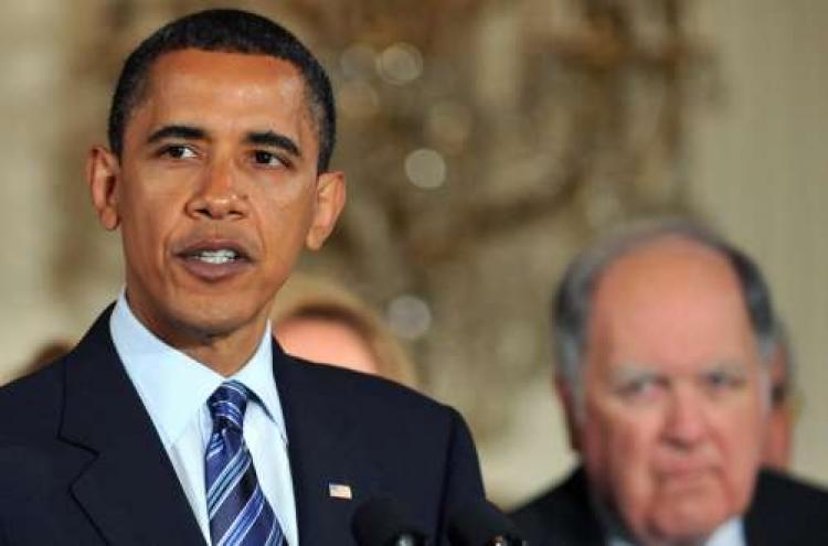 US President Barack Obama (L) makes remarks on the principle that new tax or entitlement policies should be paid for, often called PAYGO as House Budget Committee Chairman John Spratt listens at the East Room of the White House in Washington, DC, on June  (Jewel Samad/AFP/Getty Images)