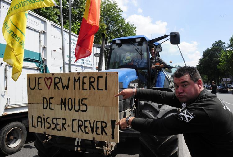 Milk producers protest ahead of an EU summit near the European Council headquarters on June 18, 2009 in Brussels.  (Dominique Faget/AFP/Getty Images)