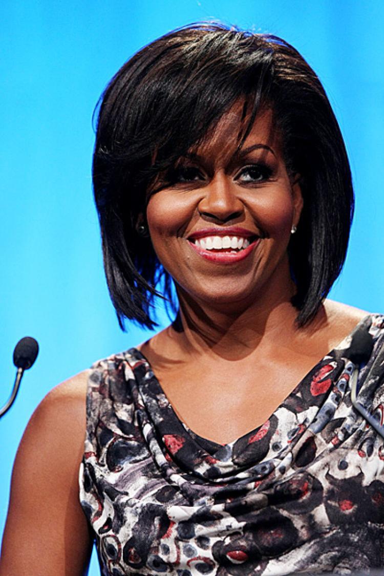 ENCOURAGING COMMUNITY SERVICE: U.S. first lady Michelle Obama spoke during the National Conference for Service and Volunteering June 22 at the Moscone Center in San Francisco. (Justin Sullivan/Getty Images for Entertainment Industry Foundation)