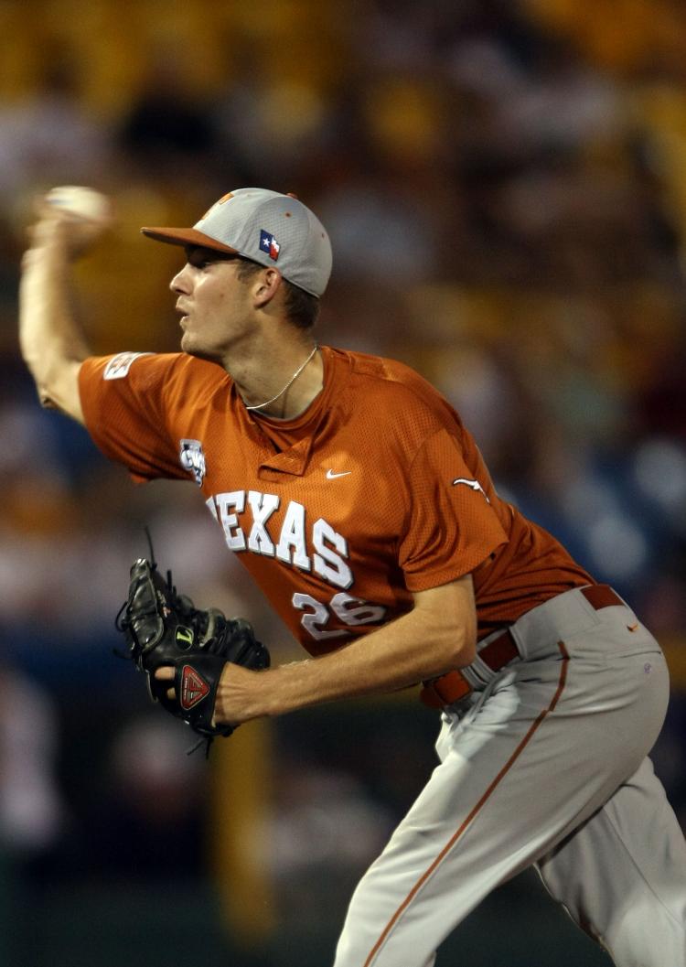 COMPLETE GAME: Texas Longhorns pitcher Taylor Jungmann fires one in Game 2 of the NCAA College World Series in Omaha. (Elsa/Getty Images)