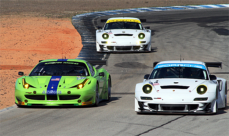 The Krohn Ferrari psars with the two Flying Lizard Porsches during the ALMS Winter Test Wednesday afternoon session. (James Fish/The Epoch Times)