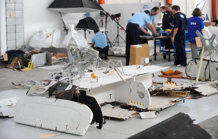  Investigators of the BEA (the French bureau leading the crash investigation) inspect debris from the mid-Atlantic crash of Air France flight 447 on July 24, 2009 at the CEAT aeronautical laboratory in Toulouse, southern France. (Eric Cabanis/AFP/Getty Images)