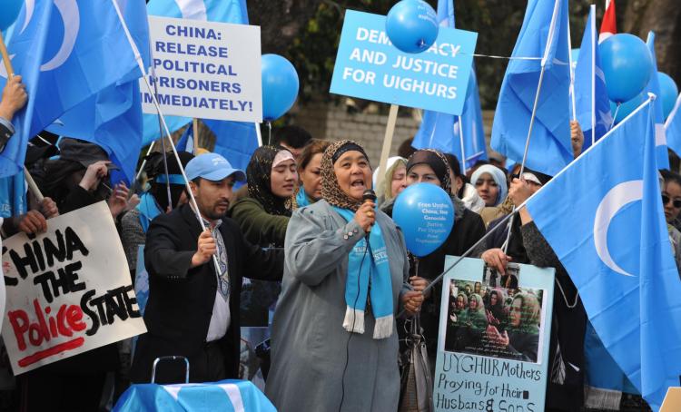 A protest outside the Chinese Consulate in Melbourne as Uyghurs accuse the Chinese Communist Party of atrocities against protesters in Urumqi. (Paul Crock/AFP/Getty Images)