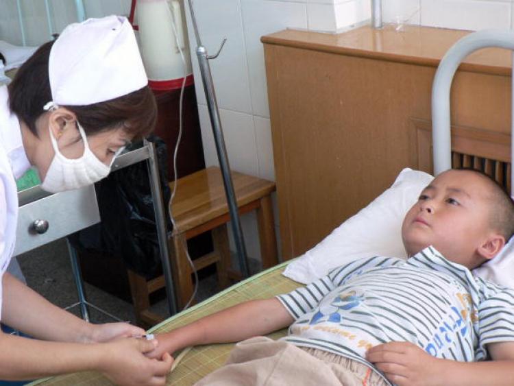 A Chinese boy gets treatment for lead poisoning at a hospital in Changqing, north China's Shaanxi province on August 15, 2009. (STR/AFP/Getty Images) A Chinese boy gets treatment for lead poisoning at a hospital in Changqing, north China's Shaanxi province on August 15, 2009. (STR/AFP/Getty Images)