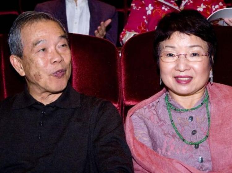Mrs. Chen, president of a chemical company, and her husband, Mr. Fan (Bao Tang/The Epoch Times)