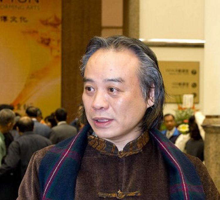 Mr. Yihan, Chinese ink painting artist and art critic, attends the Divine Performing Arts Show in Taipei on March 1, 2009. (Tang Bin / The Epoch Times)