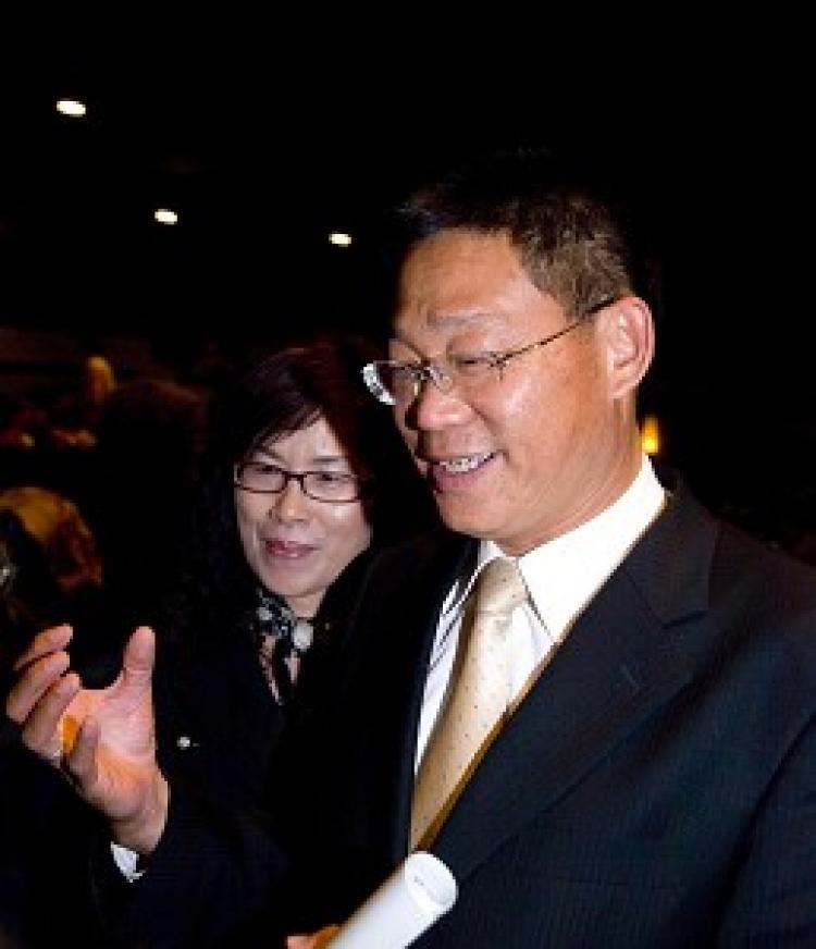 Liu Zehong, principal of National Yuan-Lin Vocational High School of Home Economics and Business, and his wife (Tang Bin/The Epoch Times)