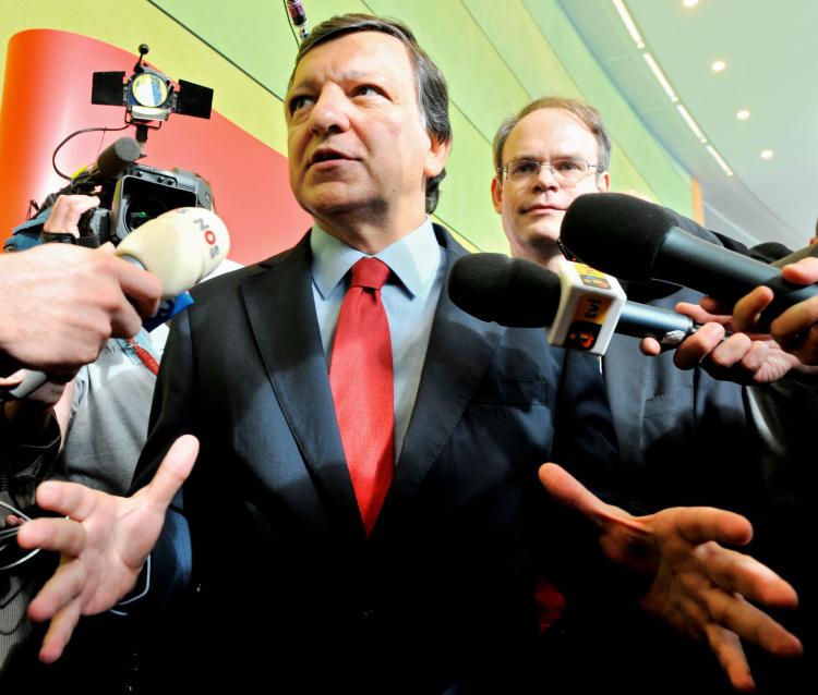 European Commission President Jose Manuel Barroso (L) speaks to journalists as he arrives for a meeting with a group of European Parliament socialists and democrats at the European Parliament headquarters in Brussels on Sept. 9. (Georges Gobet/AFP/Getty Images)