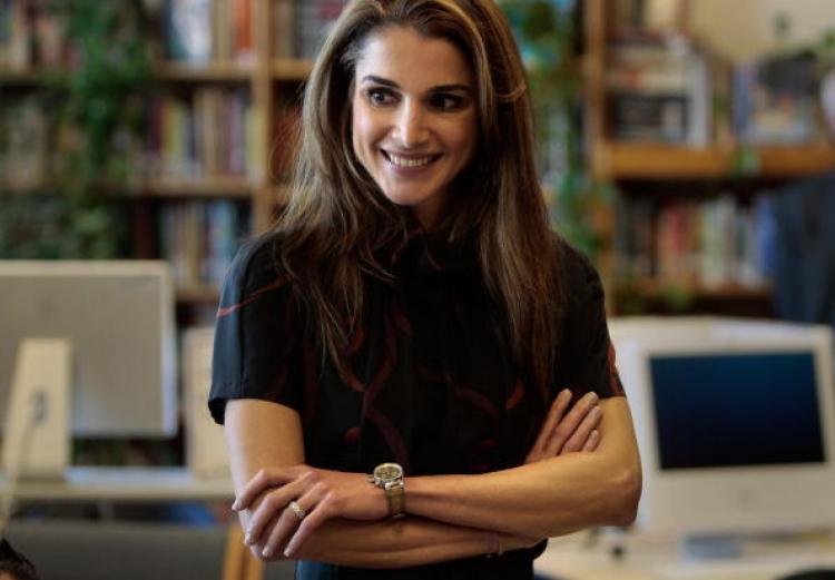 INSPIRATION: Queen Rania of Jordan smiles in a classroom at the Young Women's Leadership School in East Harlem.  (Chris Hondros/Getty Images)