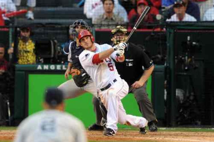 Jeff Mathis #5 of the Los Angeles Angels of Anaheim hits a walks off double in 11th inning in Game Three of the ALCS during the 2009 MLB Playoffs at Angel Stadium on October 19, 2009 in Anaheim, California. The Angels defeated the Yankees 5-4 in 11 innings. (Harry How/Getty Images)