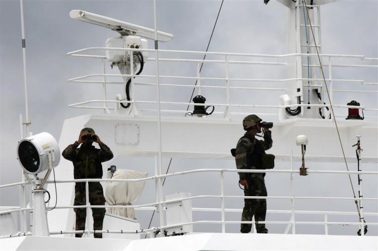 French militaries, members of the Equipe de Protection Embarquee (EPE) (Protection corp aboard) are pictured on the Drennec tuna-fishing boat on Oct. 18, 2009 at the Port Victoria. (Joel Saget/AFP/Getty Images)