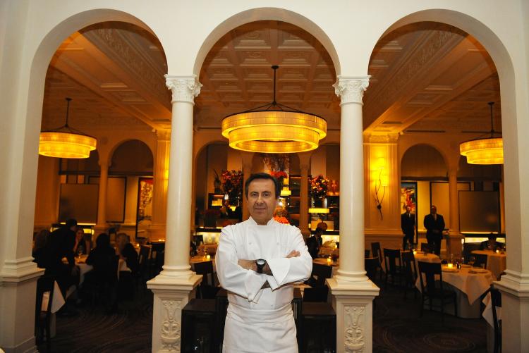 French chef Daniel Boulud poses at the entrance at his flagship restaurant Daniel in New York, October 27, 2009. Restaurant Week NYC kicked off on Monday with 'Daniel' coming in at number 3 on the top 10 best restaurants in the city on OpenTable.com.  (Emmanuel Dunand/Getty Images)