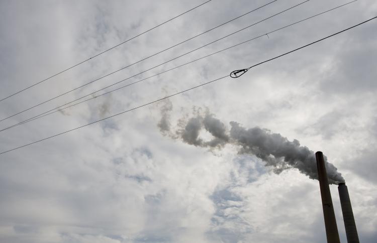 Power lines run past the smoke stacks at American Electric Power's (AEP) Mountaineer coal power plant in New Haven, West Virginia, October 30, 2009.  (Saul Loeb/AFP/Getty Images)