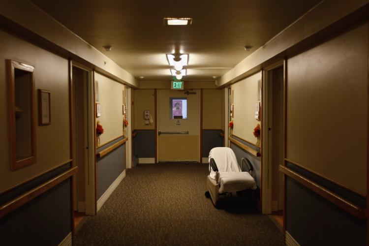 A mobile recliner sits outside the room of a terminally ill resident of the Hospice of Saint John on November 5, 2009 in Lakewood, Colorado. The non-profit hospice accepts patients regardless of their ability to pay, although most are covered by Medicare and Medicaid. (John Moore/Getty Images)