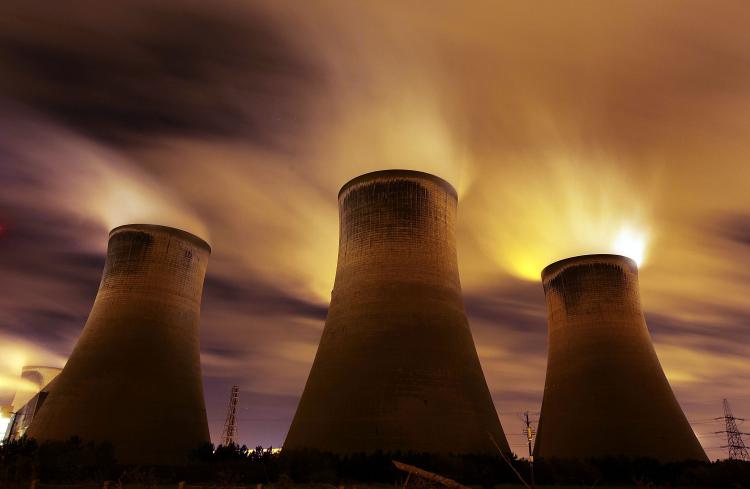 The coal fueled Fiddlers Ferry power station emits vapor on Nov. 16, 2009 in Warrington, U.K. As world leaders prepare to gather for the Copenhagen Climate Summit, the release of hacked emails onto the Internet has caused a furor over the ethics of climate scientists. (Christopher Furlong/Getty Images)