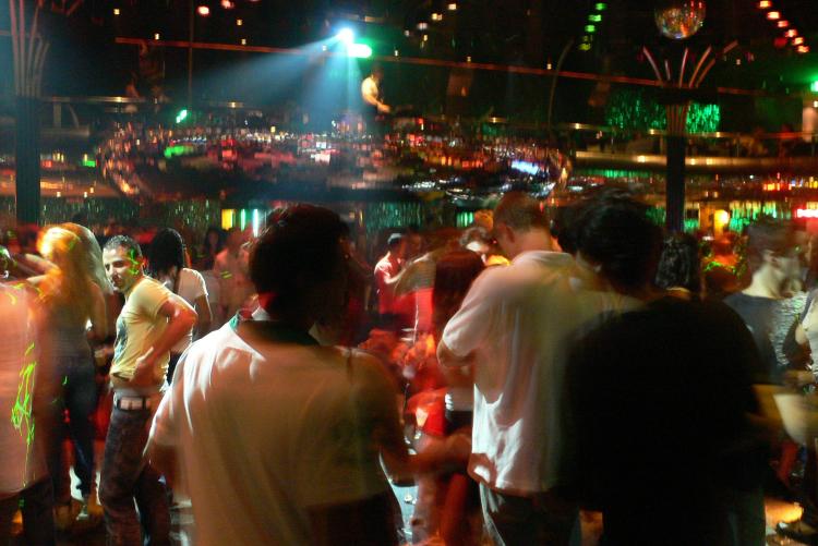 A Dec. 28 decree made nightclub operating and alcohol serving hour uniform across France. Above are dancers at at a French club. (Marcelo Lluberas/AFP/Getty Images)