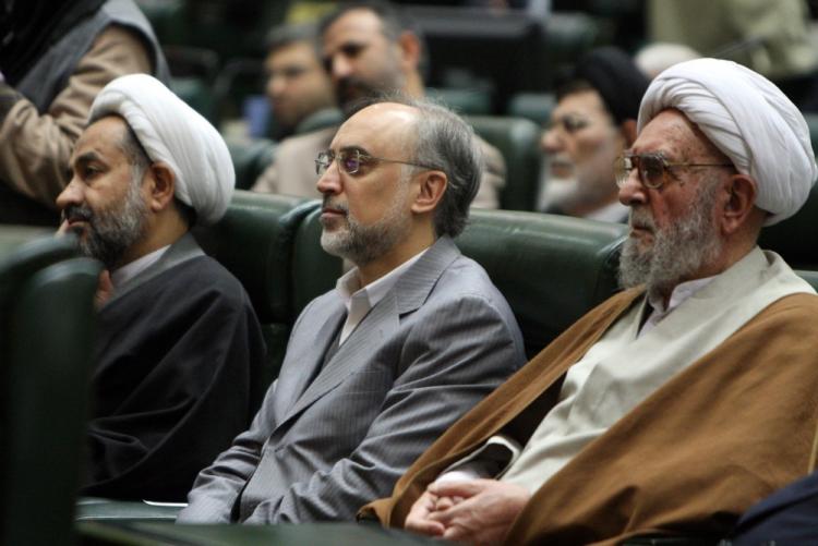 Iran's atomic chief Ali Akbar Salehi (C) listens along with other unidentified officials to a speech in 2009. Salehi said Iran was ready to engage in new negotiations about its nuclear program. (Atta Kenare/AFP/Getty Images)