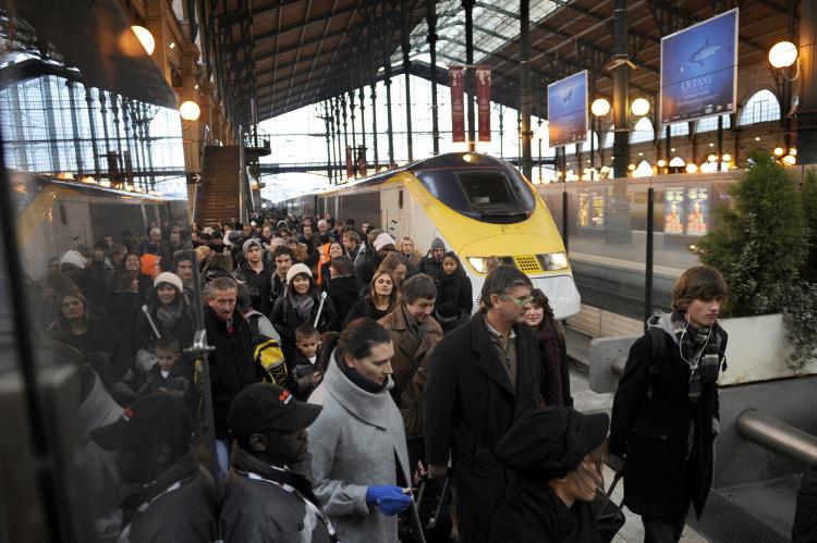 Travelers walk on a platform at Paris Gare du Nord northbound railway station on Dec. 22, 2009, in Paris, after leaving the week's first Eurostar train from London as the company resumed a limited service after a three-day shutdown caused by breakdowns in (Fred Dufour/AFP/Getty Images)