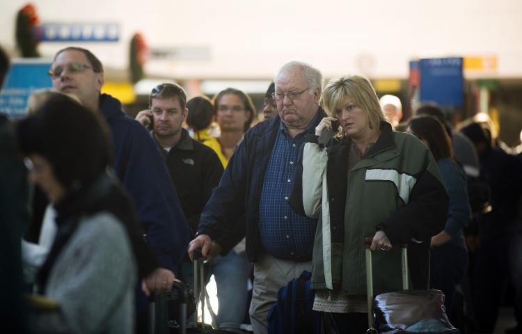 Heightened security caused long waits and missed flights at airports in Canada and the United States after a Nigerian man attempted a terrorist attack on a Northwest Airlines flight on Christmas Day in Detroit.  (Jim Watson/AFP/Getty Images)