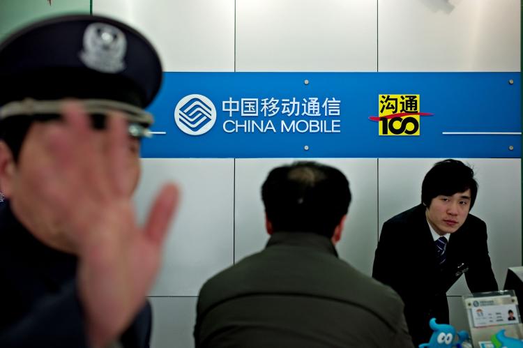China Mobile in Shanghai announced that it will censor text messages and forward offending messages to the police.(Philippe Lopez/AFP/Getty Images)