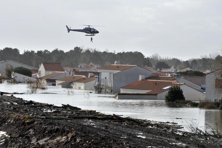 A picture taken on Feb. 28 shows a flooded street, as a result of heavy floods, in La Faute-sur-Mer Western France.