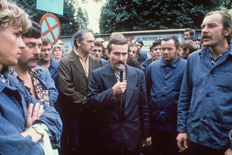 Lech Walesa (microphone) with striking workers in the Lenin Shipyard in Gdansk 30th August, 1980. (AFP/Getty Images)